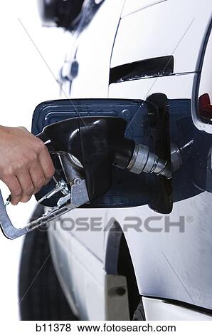 Filling up gas tank View Large Photo Image Stock Photo - Filling up gas tank. Fotosearch