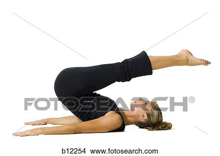 Fit woman stretching and exercising View Large Photo Image Picture - Fit woman stretching and exercising. Fotosearch