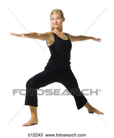 Fit woman stretching and exercising View Large Photo Image Stock Image - Fit woman stretching and exercising. Fotosearch