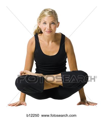 Fit woman stretching and exercising View Large Photo Image Stock Image - Fit woman stretching and exercising. Fotosearch