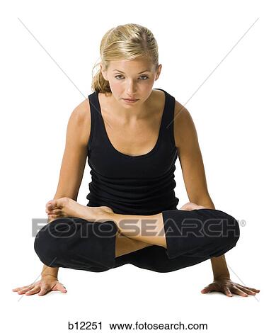 Fit woman stretching and exercising View Large Photo Image Stock Image - Fit woman stretching and exercising. Fotosearch