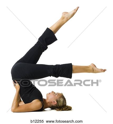 Fit woman stretching and exercising View Large Photo Image Stock Photography - Fit woman stretching and exercising. Fotosearch