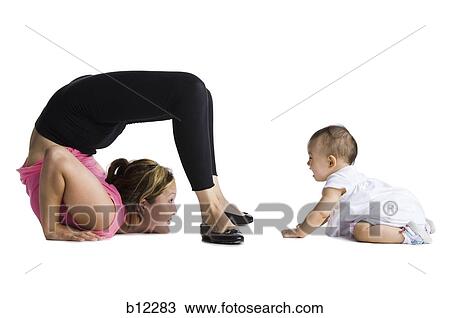 Stock Image - Flexible mother and daughter. Fotosearch