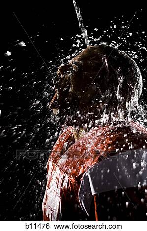 Football player cooling off with water View Large Photo Image Stock Photograph - Football player cooling off with water. Fotosearch