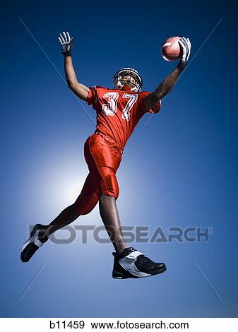 Stock Photo - Football player. Fotosearch