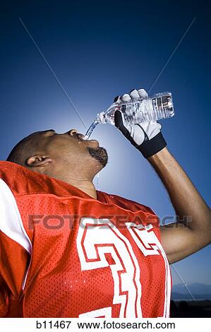 Stock Photo - Football player. Fotosearch