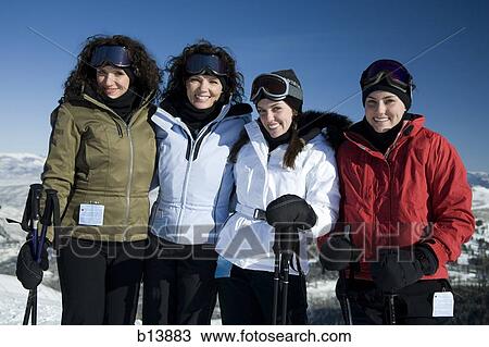 Four women outdoors in winter skiing View Large Photo Image Stock Image - Four women outdoors in winter skiing. Fotosearch