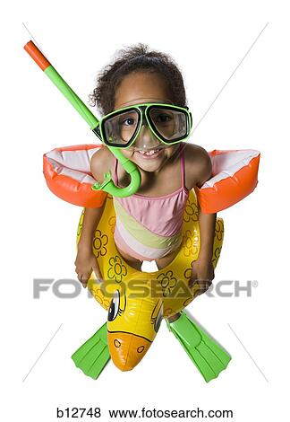 Funny kid in swimming gear View Large Photo Image Stock Photo - Funny kid in swimming gear. Fotosearch