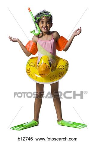 Funny kid in swimming gear View Large Photo Image Stock Photograph - Funny kid in swimming gear. Fotosearch