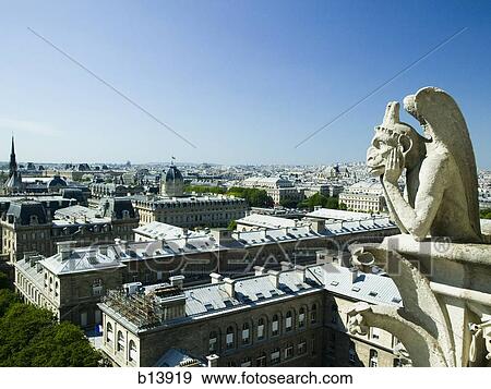Stock Photo - Gargoyle atop building. Fotosearch
