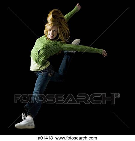 Girl leaping and smiling View Large Photo Image Stock Photo - Girl leaping and smiling. Fotosearch