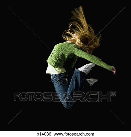 Girl leaping View Large Photo Image Stock Photograph - Girl leaping. Fotosearch