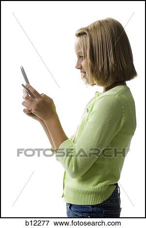 Girl with cell phone View Large Photo Image Stock Photo - Girl with cell phone. Fotosearch