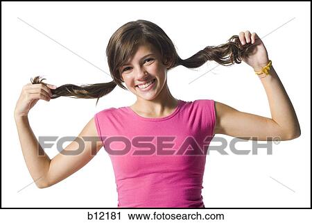 Girl with long pigtails View Large Photo Image Stock Image - Girl with long pigtails. Fotosearch