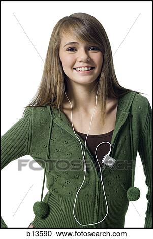 Girl with mp3 player smiling View Large Photo Image Stock Image - Girl with mp3 player smiling. Fotosearch