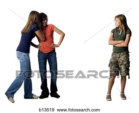 Girls whispering about another girl View Large Photo Image Stock Photo - Girls whispering about another girl. Fotosearch