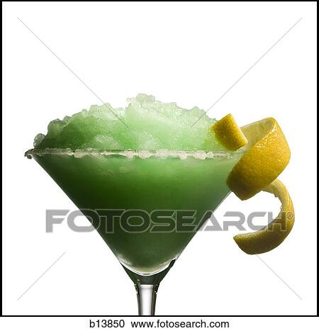 Green slush beverage in cocktail glass with lemon garnish View Large Photo Image Stock Image - Green slush beverage in cocktail glass with lemon garnish. Fotosearch