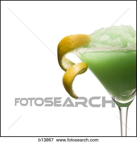 Green slush beverage in cocktail glass with lemon garnish View Large Photo Image Stock Photo - Green slush beverage in cocktail glass with lemon garnish. Fotosearch