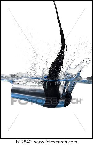 Hair dryer dropped in water View Large Photo Image Stock Image - Hair dryer dropped in water. Fotosearch