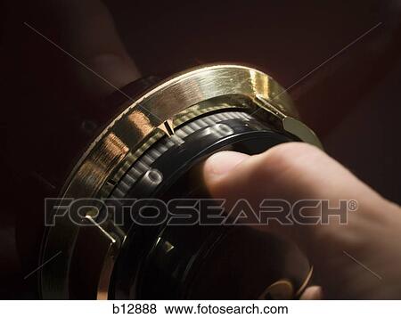 Hand opening combination lock View Large Photo Image Stock Photo - Hand opening combination lock. Fotosearch