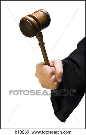 Hand with judge's gavel View Large Photo Image Stock Photo - Hand with judge's gavel. Fotosearch