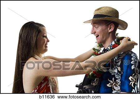 Hawaiian woman and tourist View Large Photo Image Stock Photograph - Hawaiian woman and tourist. Fotosearch