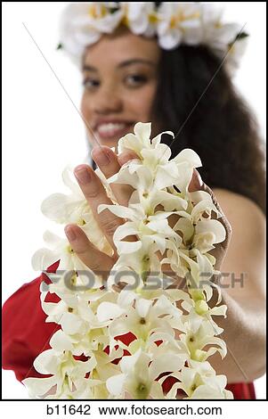 Stock Image - Hawaiian woman with lei. Fotosearch