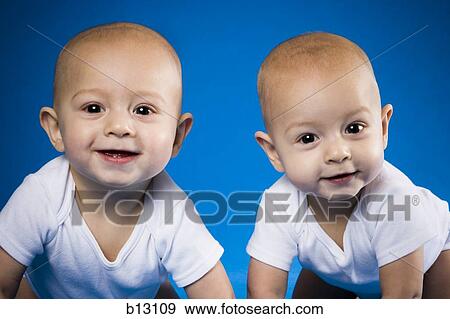 Identical twin babies View Large Photo Image Stock Photo - Identical twin babies. Fotosearch