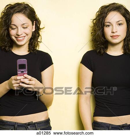 Identical twin teenage girls View Large Photo Image Stock Photography - Identical twin teenage girls. Fotosearch