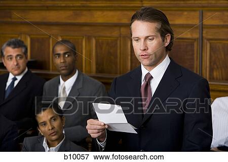 Juror standing in a jury box and reading the verdict View Large Photo Image Stock Photo - Juror standing in a jury box and reading the verdict. Fotosearch