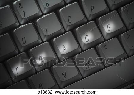 Stock Image - Keyboard with TRADE highlighted. Fotosearch