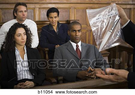 Lawyer presenting evidence to jurors View Large Photo Image Picture - Lawyer presenting evidence to jurors. Fotosearch