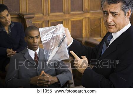 Lawyer presenting evidence to jurors View Large Photo Image Stock Photography - Lawyer presenting evidence to jurors. Fotosearch