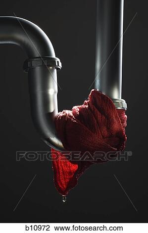 Stock Image - Leaking pipe with dripping rag. Fotosearch