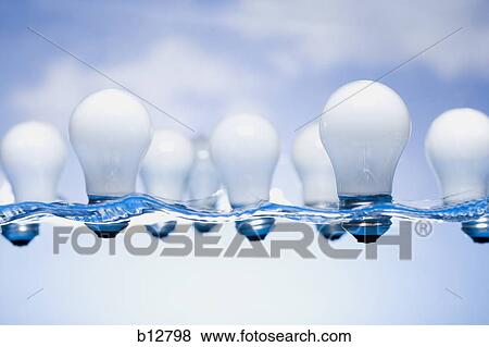 Light bulbs floating in water View Large Photo Image Stock Photo - Light bulbs floating in water. Fotosearch