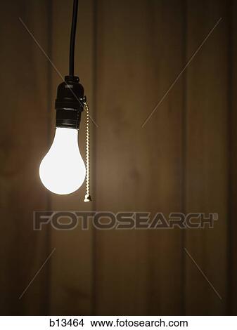 Lightbulb Hanging From Ceiling Picture B13464 Fotosearch Lightbulb Hanging From Ceiling Picture