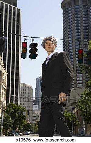 Low angle view of a mannequin portraying a businessman View Large Photo Image Stock Photograph - Low angle view of a mannequin portraying a businessman. Fotosearch