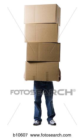 Low section view of a man holding a stack of cardboard boxes View Large Photo Image Stock Photo - Low section view of a man holding a stack of cardboard boxes. Fotosearch