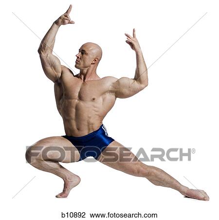 Male bodybuilder posing View Large Photo Image Stock Image - Male bodybuilder posing. Fotosearch