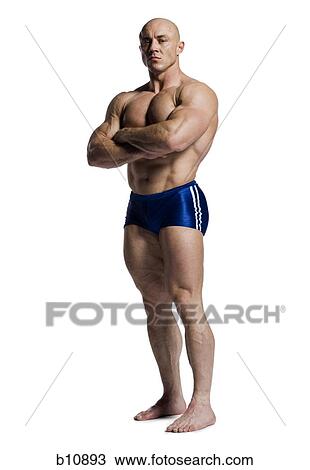 Male bodybuilder posing View Large Photo Image Stock Image - Male bodybuilder posing. Fotosearch