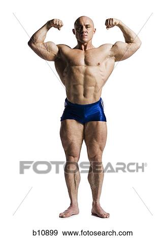 Male bodybuilder posing View Large Photo Image Stock Photo - Male bodybuilder posing. Fotosearch