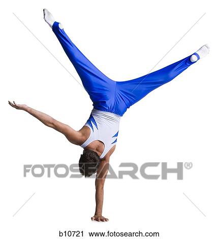 Male gymnast doing floor exercises View Large Photo Image Stock Image - Male gymnast doing floor exercises. Fotosearch