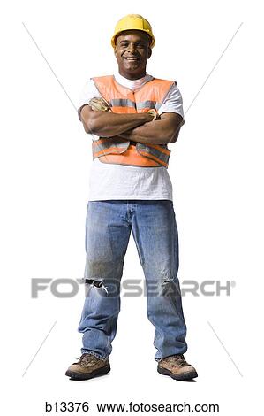 Male road worker with crossed arms and hardhat smiling View Large Photo Image Stock Photograph - Male road worker with crossed arms and hardhat smiling. Fotosearch