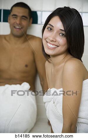 Man and woman in steam bath with towels smiling View Large Photo Image Stock Photography - Man and woman in steam bath with towels smiling. Fotosearch