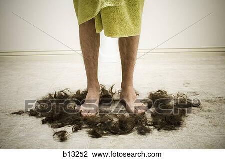 Man in bath towel standing in hair View Large Photo Image Stock Image - Man in bath towel standing in hair. Fotosearch