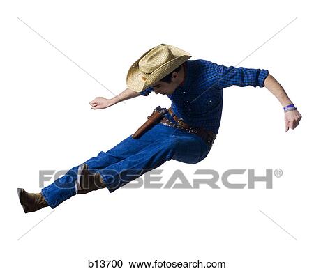 Man in cowboy costume falling View Large Photo Image Stock Image - Man in cowboy costume falling. Fotosearch