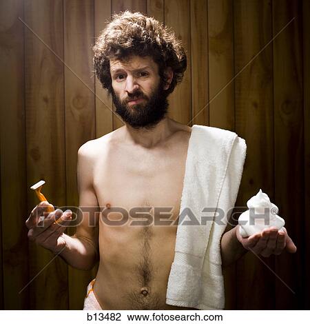 Man in towel with razor and shaving cream View Large Photo Image Stock Image - Man in towel with razor and shaving cream. Fotosearch