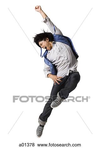Man leaping with arm up View Large Photo Image Stock Photo - Man leaping with arm up. Fotosearch
