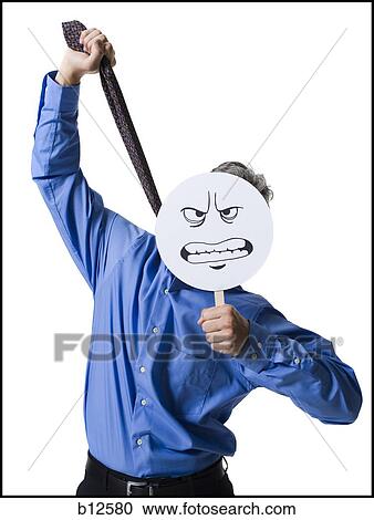 Stock Image - Man strangling himself with necktie. Fotosearch
