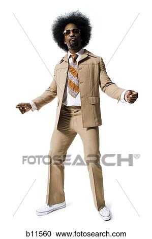 Stock Image - Man with an afro in beige suit. Fotosearch